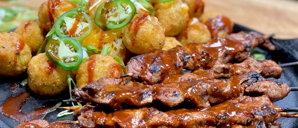 Beef Satay with Mezclajete Hot Sauce & Hush Puppies
