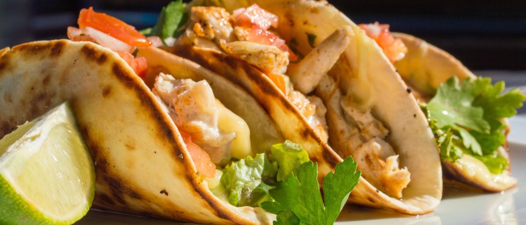 Spicy chicken tacos with honey-lime slaw