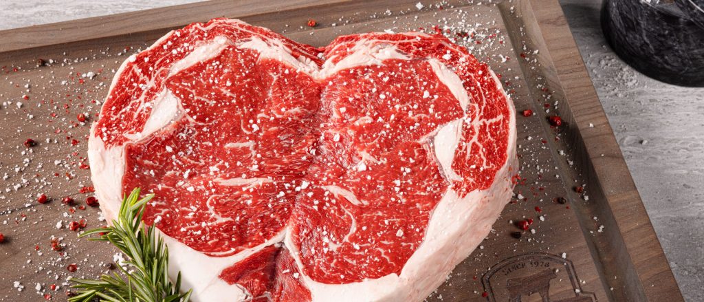 A beautifully plated heart-shaped Delmonico steak