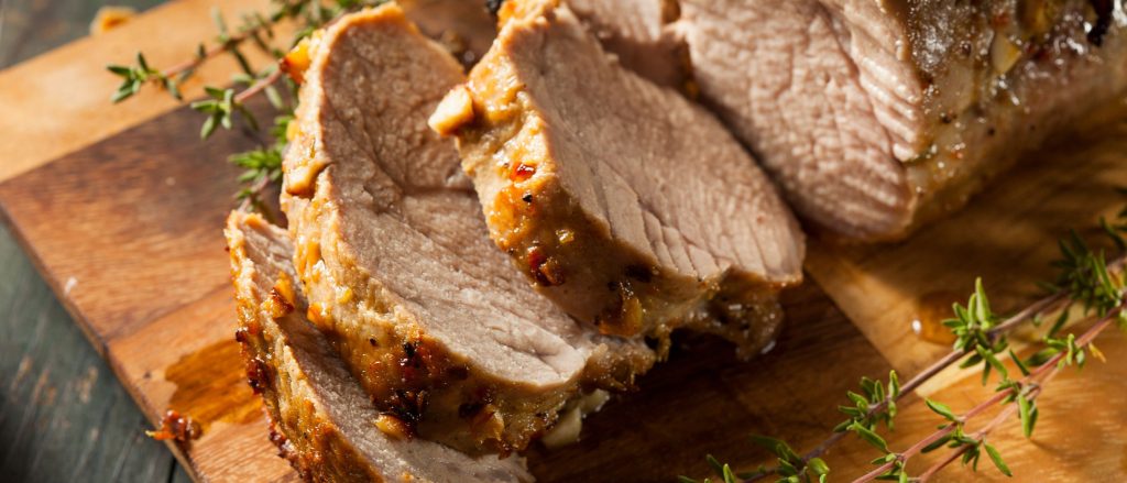 A succulent pork tenderloin marinated in a maple-garlic mixture, grilled to juicy perfection.