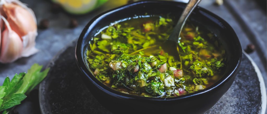 A vibrant scallion chimichurri sauce perfect for grilled meats and vegetables.