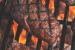 Denver Steaks on a grill